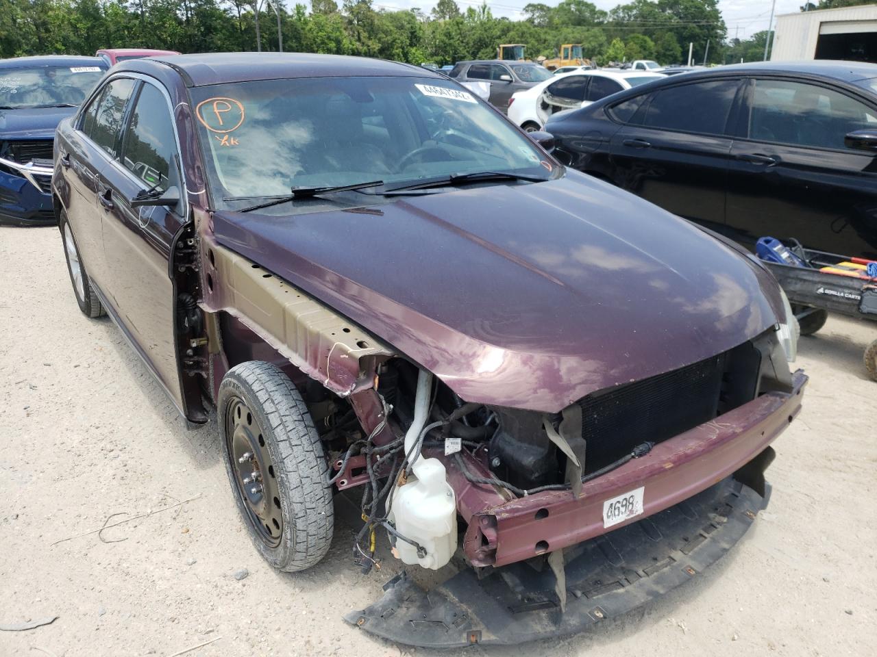 FORD TAURUS SEL 2011 with VIN 1FAHP2EW0BG164890 - Photo from auction