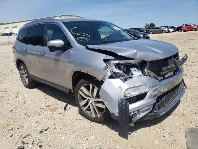 HONDA PILOT TOUR 2017 with VIN 5FNYF5H97HB008093 - Photo from auction
