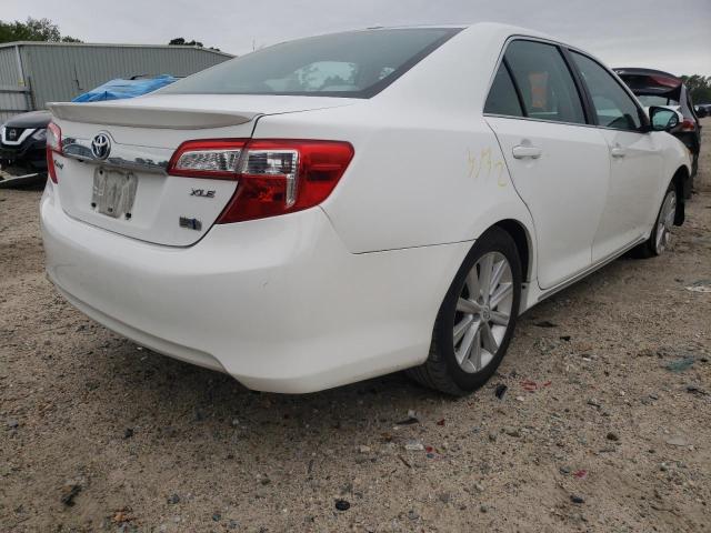 Photo 4 from auction – 2012 TOYOTA CAMRY HYBR with VIN 4T1BD1FK4CU011829