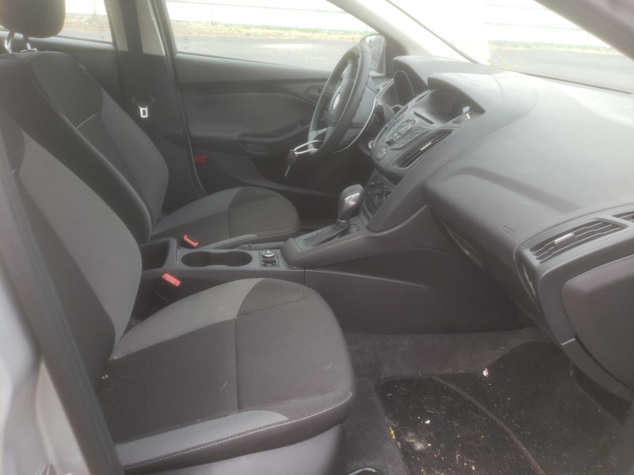 Photo 5 from auction – 2012 FORD FOCUS S with VIN 1FAHP3E21CL327431