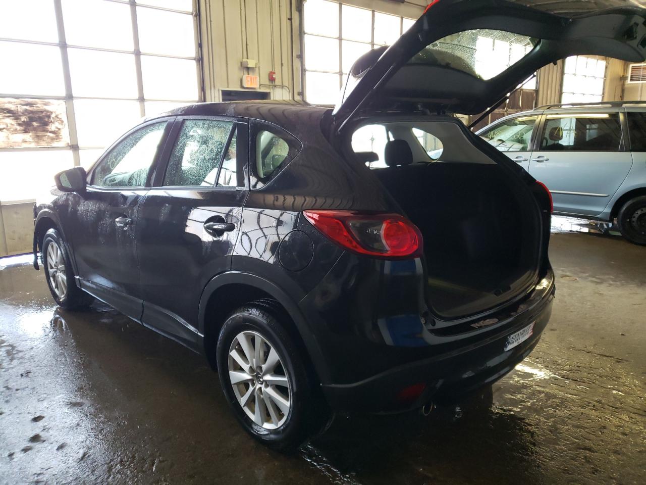 Photo 3 from auction – 2013 MAZDA CX-5 SPORT with VIN JM3KE4BE2D0142051