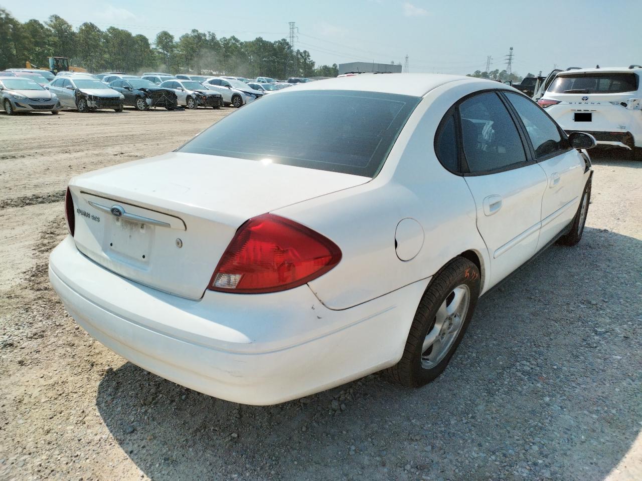 Photo 4 from auction – 2003 FORD TAURUS SES with VIN 1FAFP55203A209028
