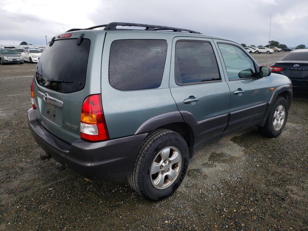 Photo 4 from auction – 2004 MAZDA TRIBUTE LX with VIN 4F2YZ94184KM18347