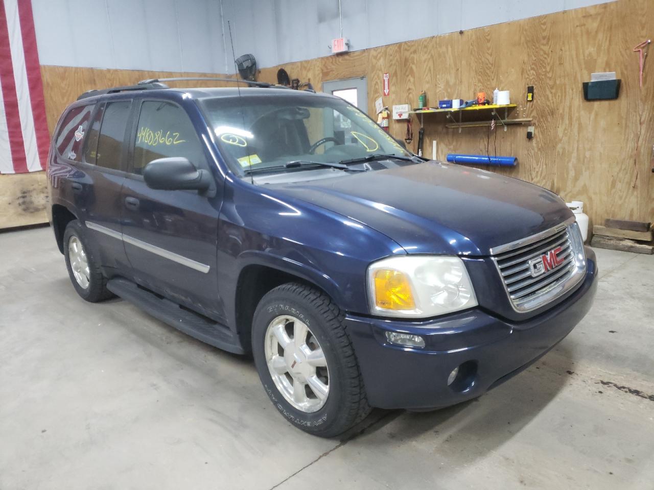 GMC ENVOY 2007 with VIN 1GKDT13S272114452 - Photo from auction