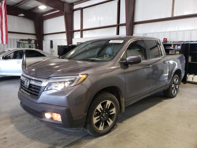 Photo 2 from auction – 2020 HONDA RIDGELINE with VIN 5FPYK3F54LB016894