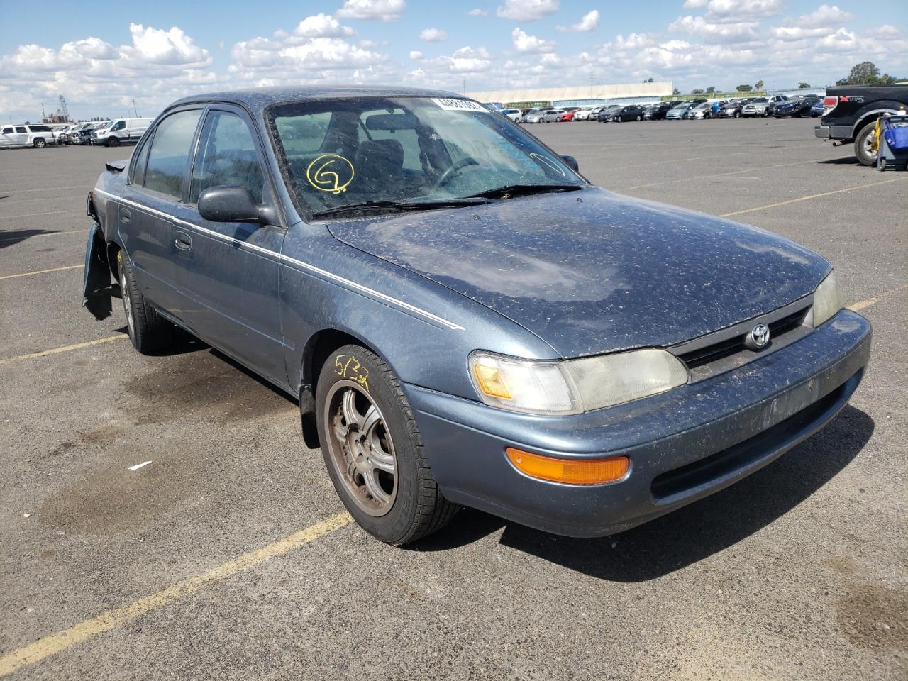 TOYOTA COROLLA 1994 with VIN 1NXAE04B7RZ211005 - Photo from auction