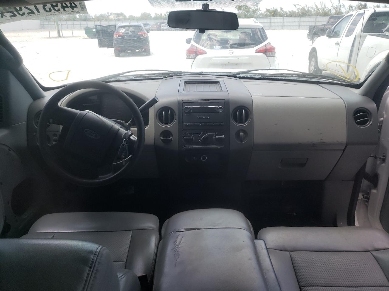 Photo 9 from auction – 2007 FORD F150 with VIN 1FTRF12297NA86299