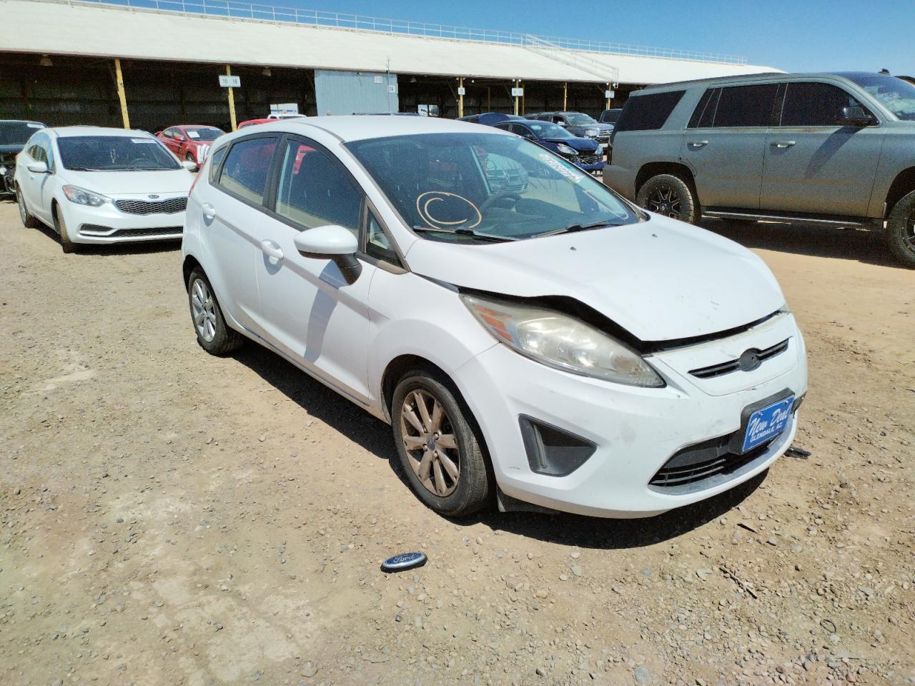 FORD FIESTA SE 2011 with VIN 3FADP4EJ5BM234095 - Photo from auction