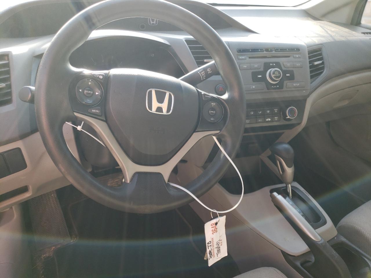 Photo 9 from auction – 2012 HONDA CIVIC LX with VIN 2HGFB2F5XCH581933