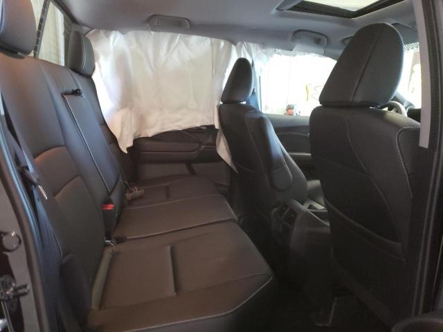 Photo 6 from auction – 2022 HONDA RIDGELINE with VIN 5FPYK3F58NB021373