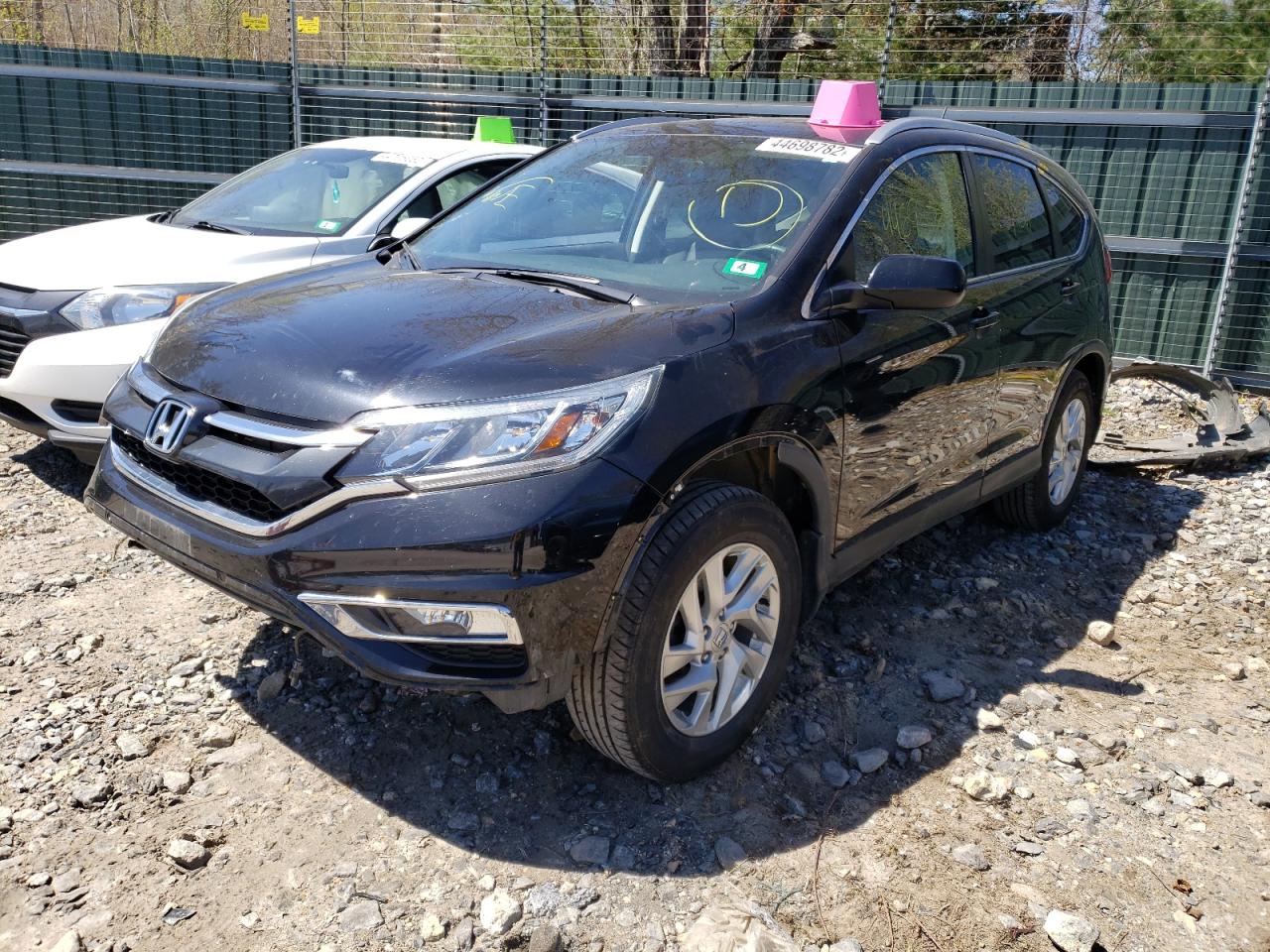 Photo 2 from auction – 2016 HONDA CR-V EXL with VIN 5J6RM4H7XGL007609