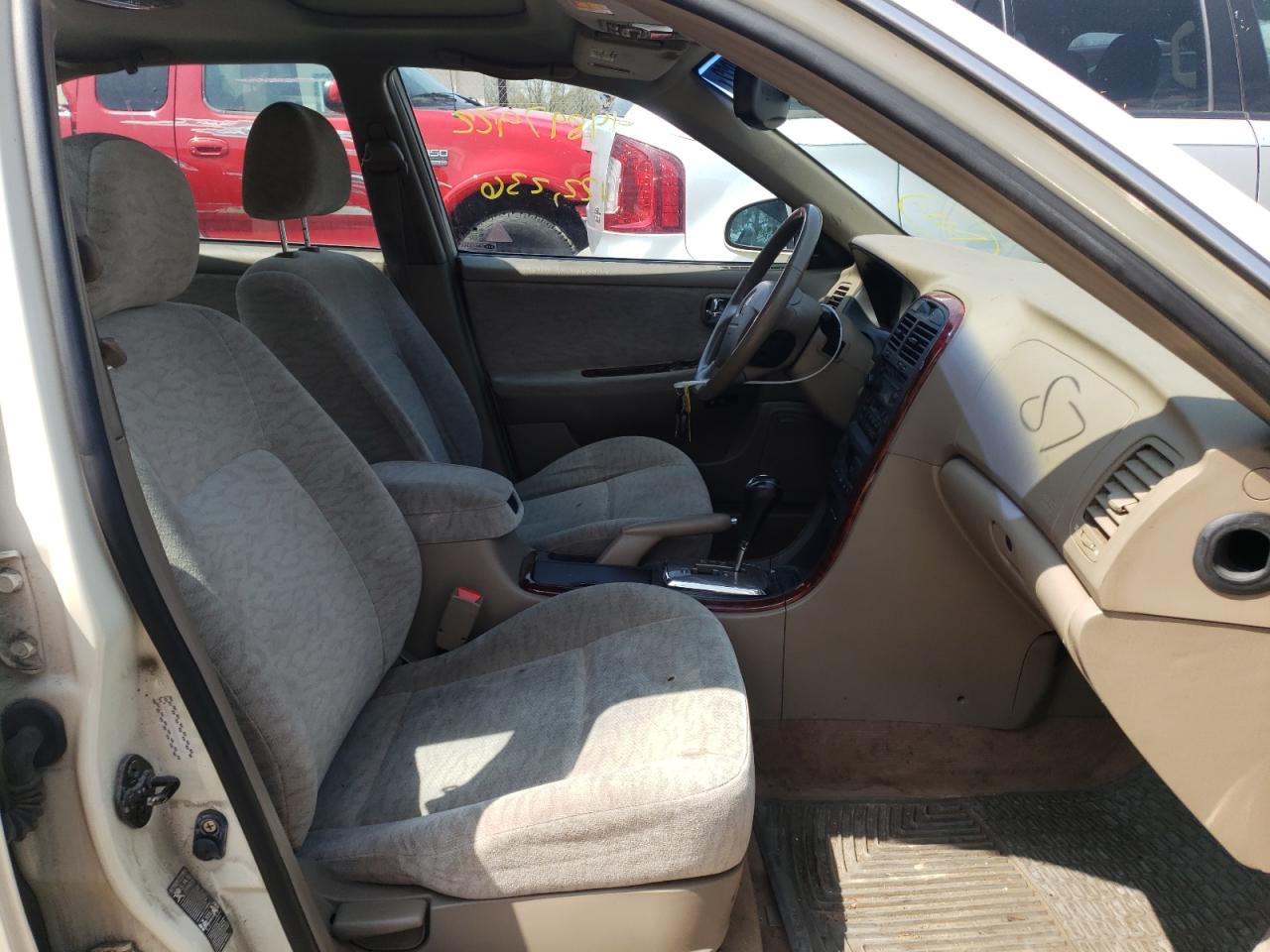 Photo 19 from auction – 2006 KIA OPTIMA LX with VIN KNAGD126465450012