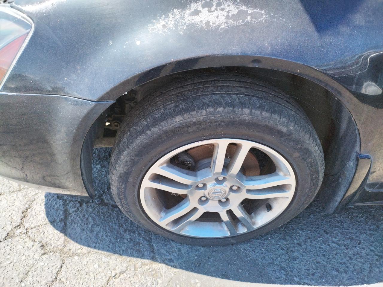 Photo 9 from auction – 2003 NISSAN ALTIMA SE with VIN 1N4BL11D93C337346