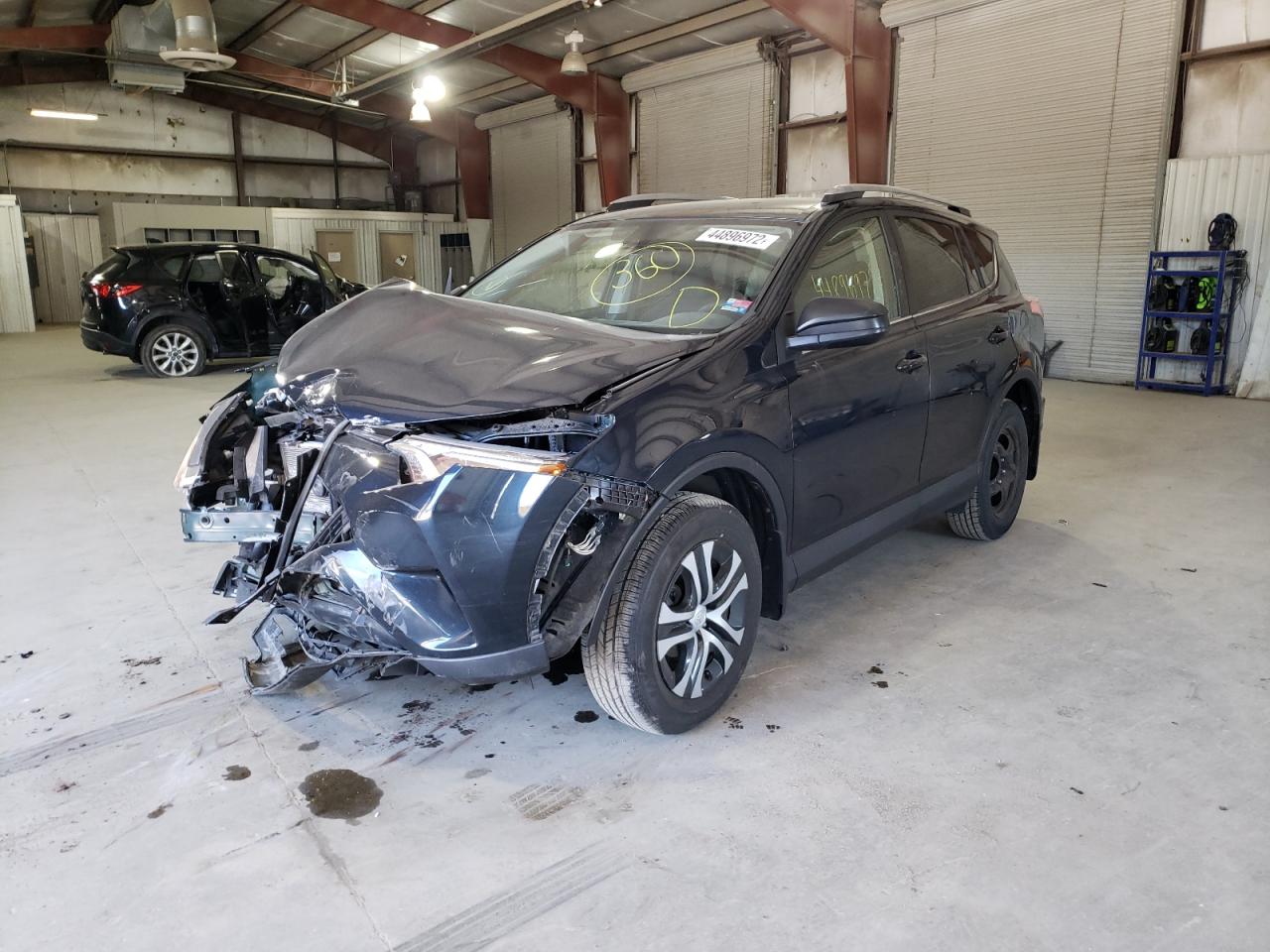 Photo 2 from auction – 2018 TOYOTA RAV4 LE with VIN JTMBFREV6JJ207262