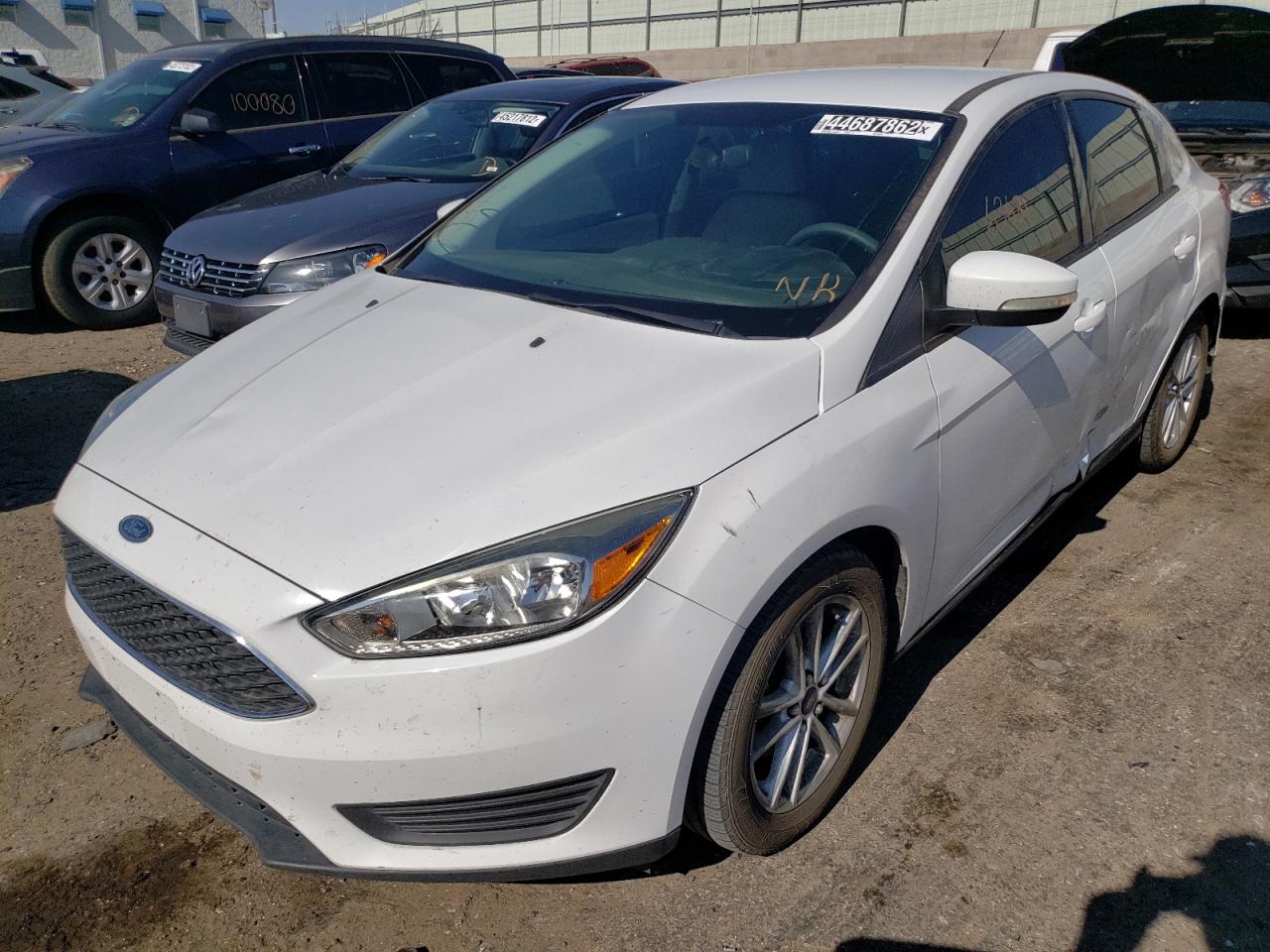 Photo 2 from auction – 2015 FORD FOCUS SE with VIN 1FADP3F27FL255779