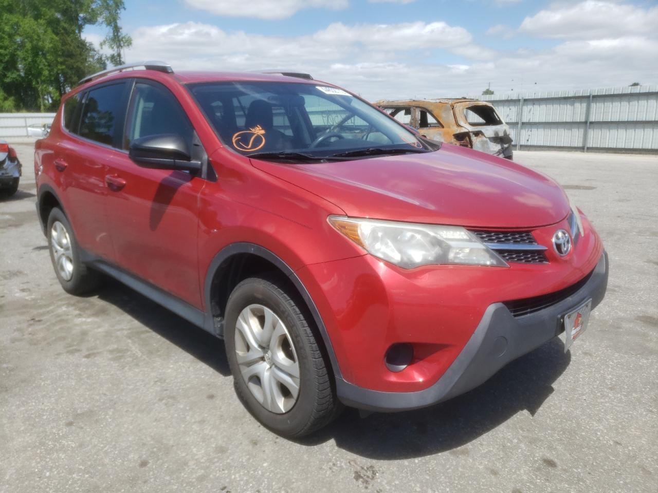 TOYOTA RAV4 LE 2014 with VIN JTMZFREVXEJ005044 - Photo from auction