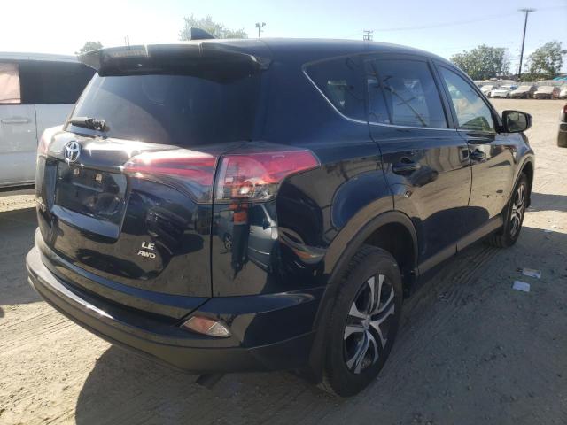 Photo 4 from auction – 2018 TOYOTA RAV4 LE with VIN JTMBFREV5JJ245243