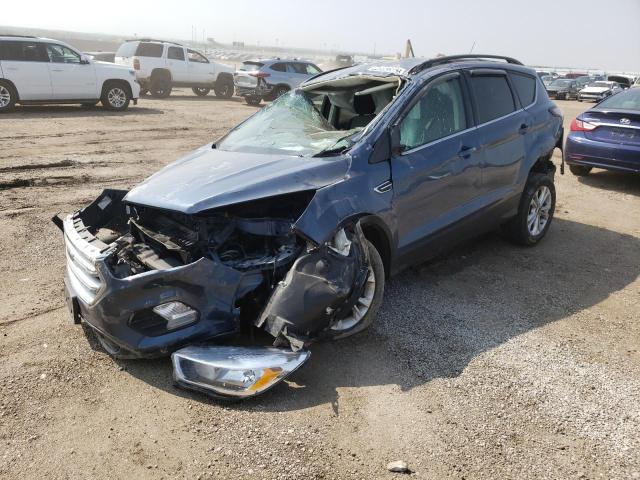 Photo 2 from auction – 2018 FORD ESCAPE SE with VIN 1FMCU9GD0JUB72713