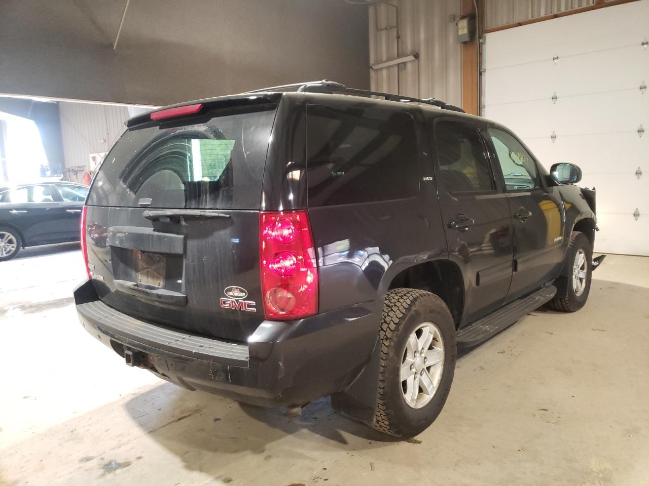 Photo 14 from auction – 2011 GMC YUKON SLT with VIN 1GKS2CE0XBR297326
