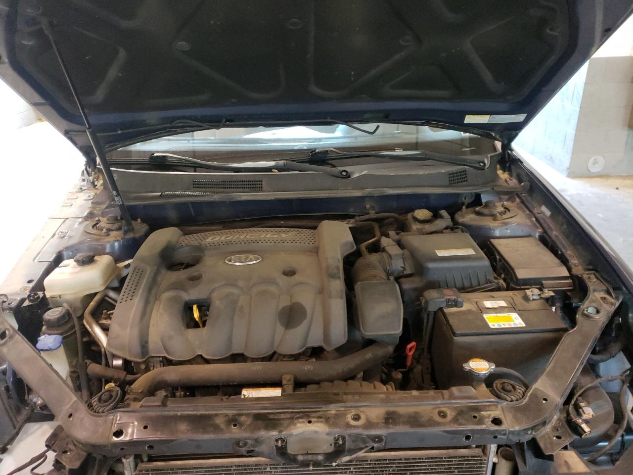 Фото 7 с аукциона – 2007 KIA OPTIMA LX с VIN KNAGE123675126337