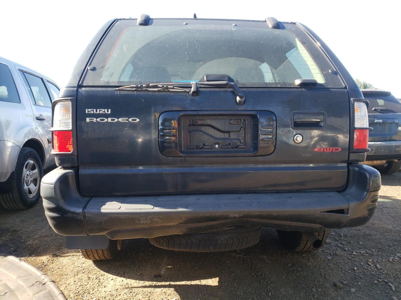 Photo 9 from auction – 2001 ISUZU RODEO with VIN 4S2DM58W414357823