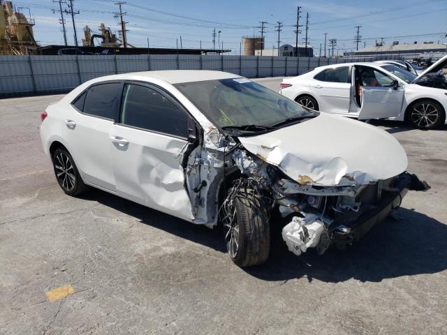 TOYOTA COROLLA L 2019 with VIN 5YFBURHE7KP856938 - Photo from auction