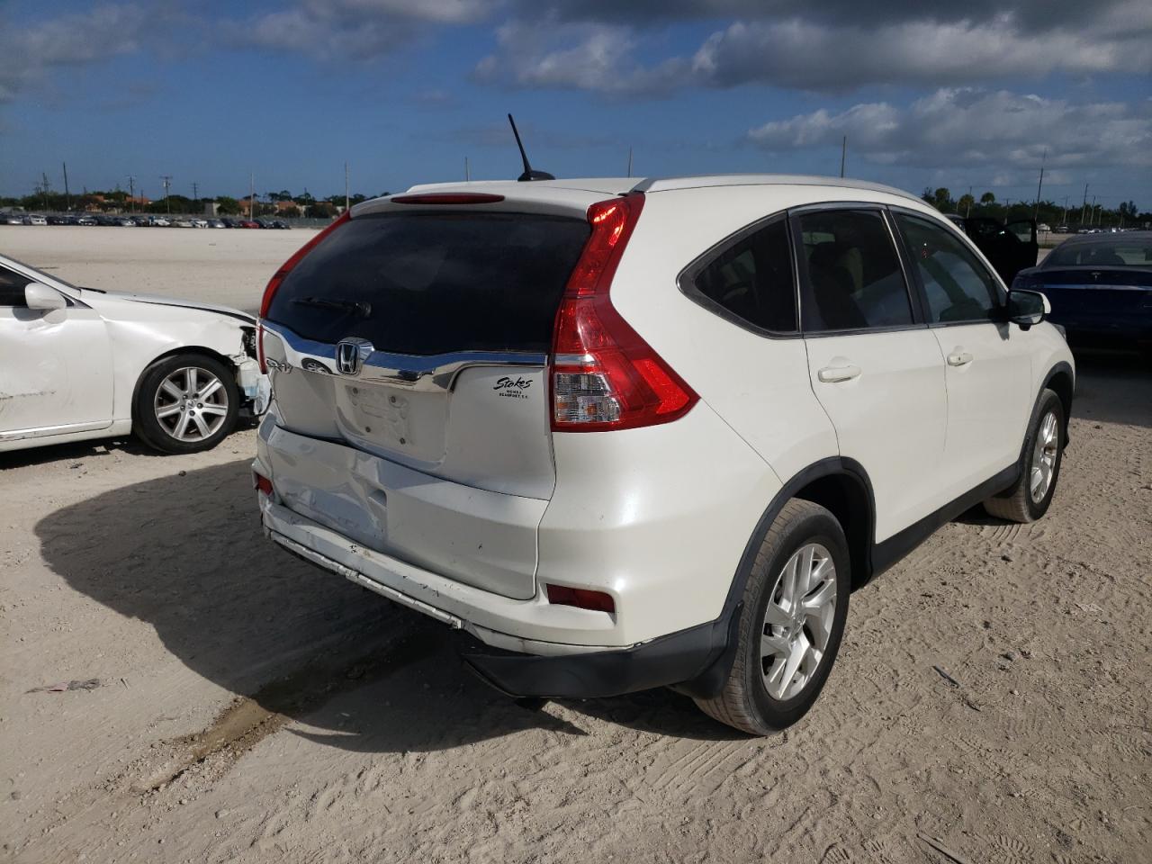 Photo 4 from auction – 2016 HONDA CR-V EXL with VIN 5J6RM3H75GL017779