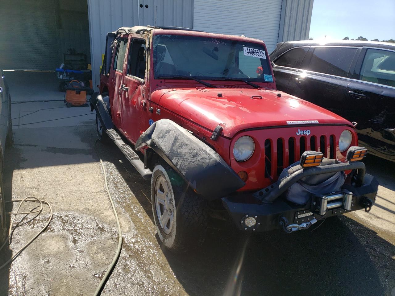 JEEP WRANGLER U 2009 with VIN 1J4GB39189L769857 - Photo from auction