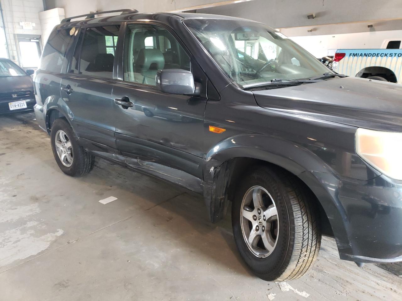 Photo 9 from auction – 2006 HONDA PILOT with VIN 5FNYF18596B012827