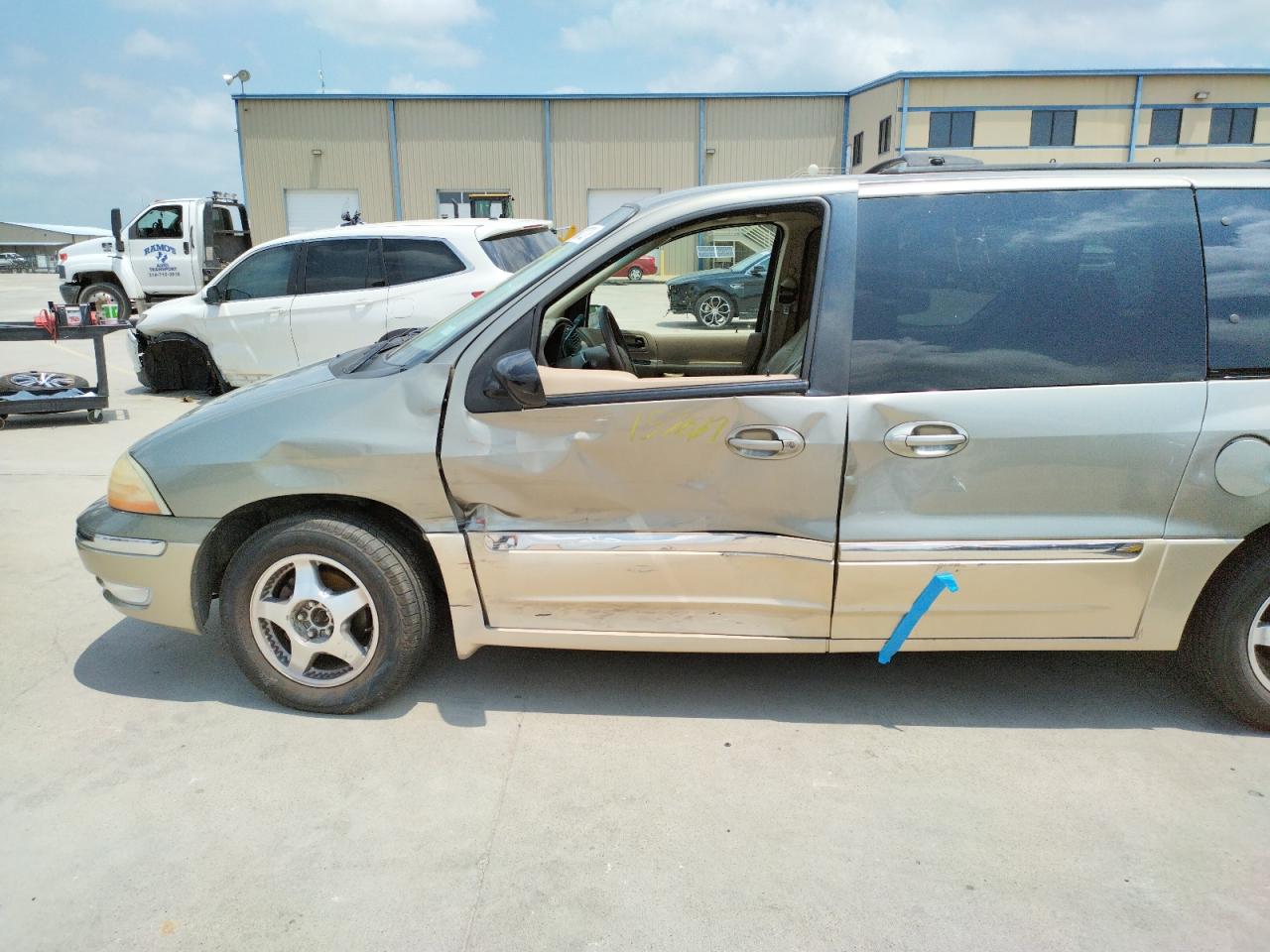 Photo 9 from auction – 2000 FORD WINDSTAR with VIN 2FMDA5344YBA72352
