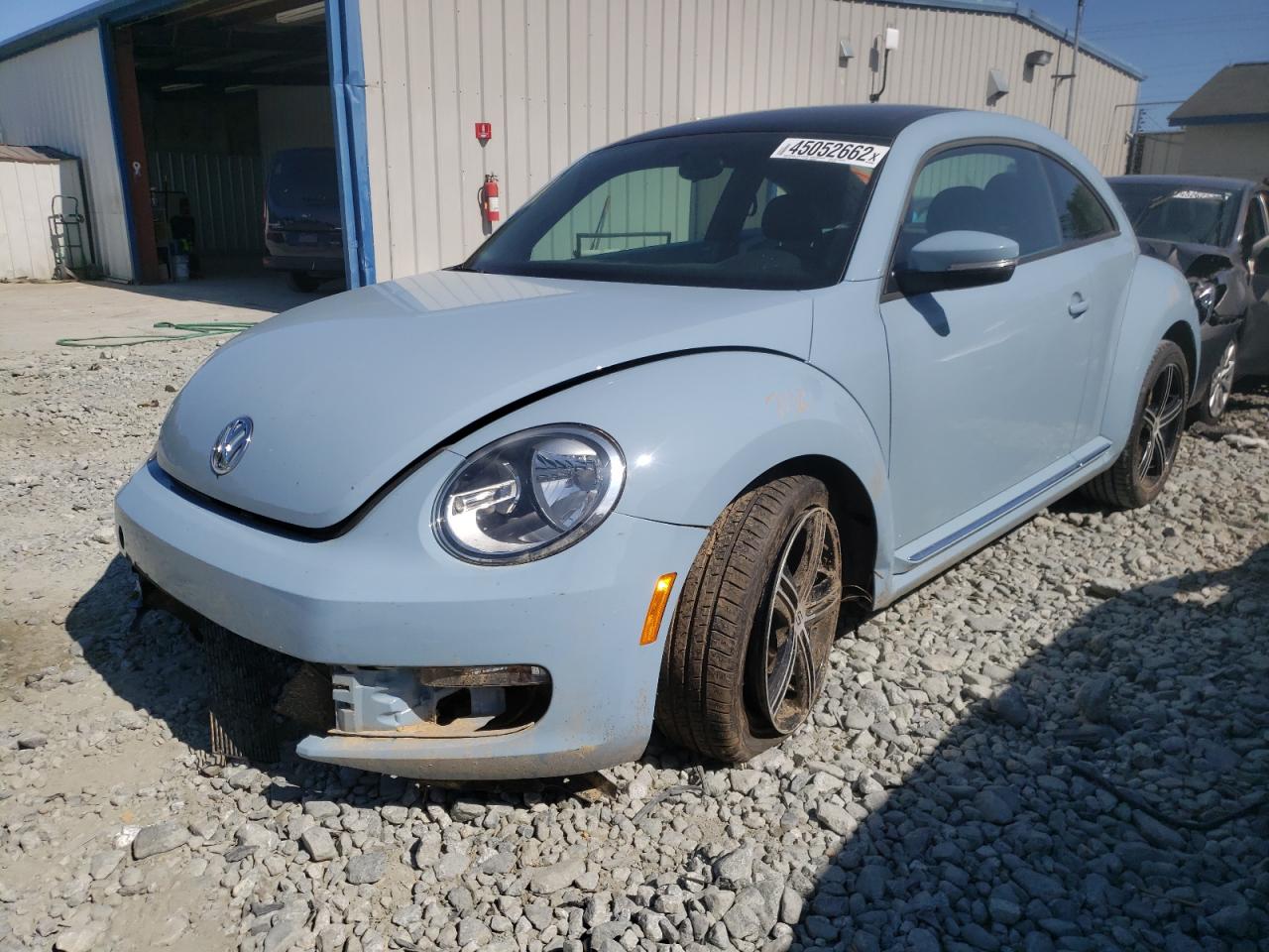 Photo 12 from auction – 2013 VOLKSWAGEN BEETLE with VIN 3VWJX7AT5DM660486