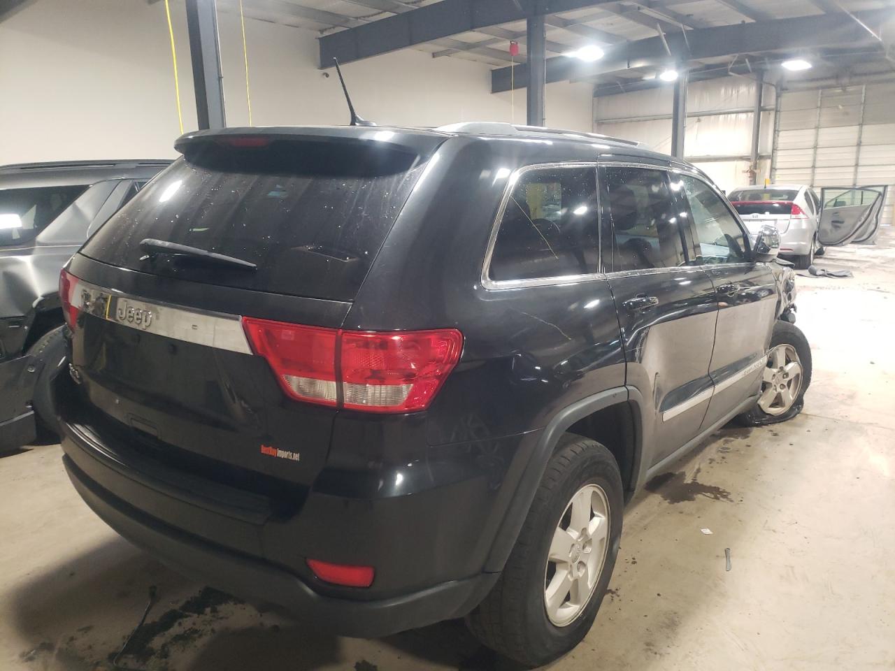 Photo 16 from auction – 2012 JEEP GRAND CHER with VIN 1C4RJFAG7CC141430