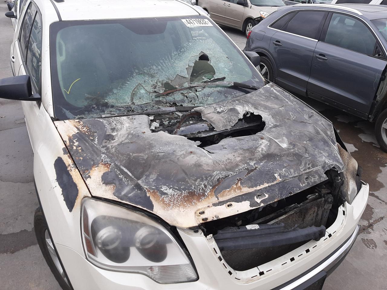 Photo 9 from auction – 2012 GMC ACADIA SLE with VIN 1GKKRPED4CJ217105