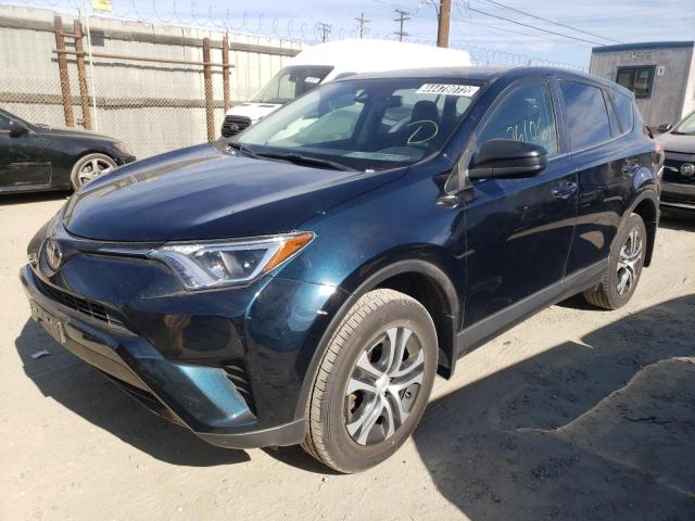Photo 2 from auction – 2018 TOYOTA RAV4 LE with VIN JTMBFREV5JJ245243