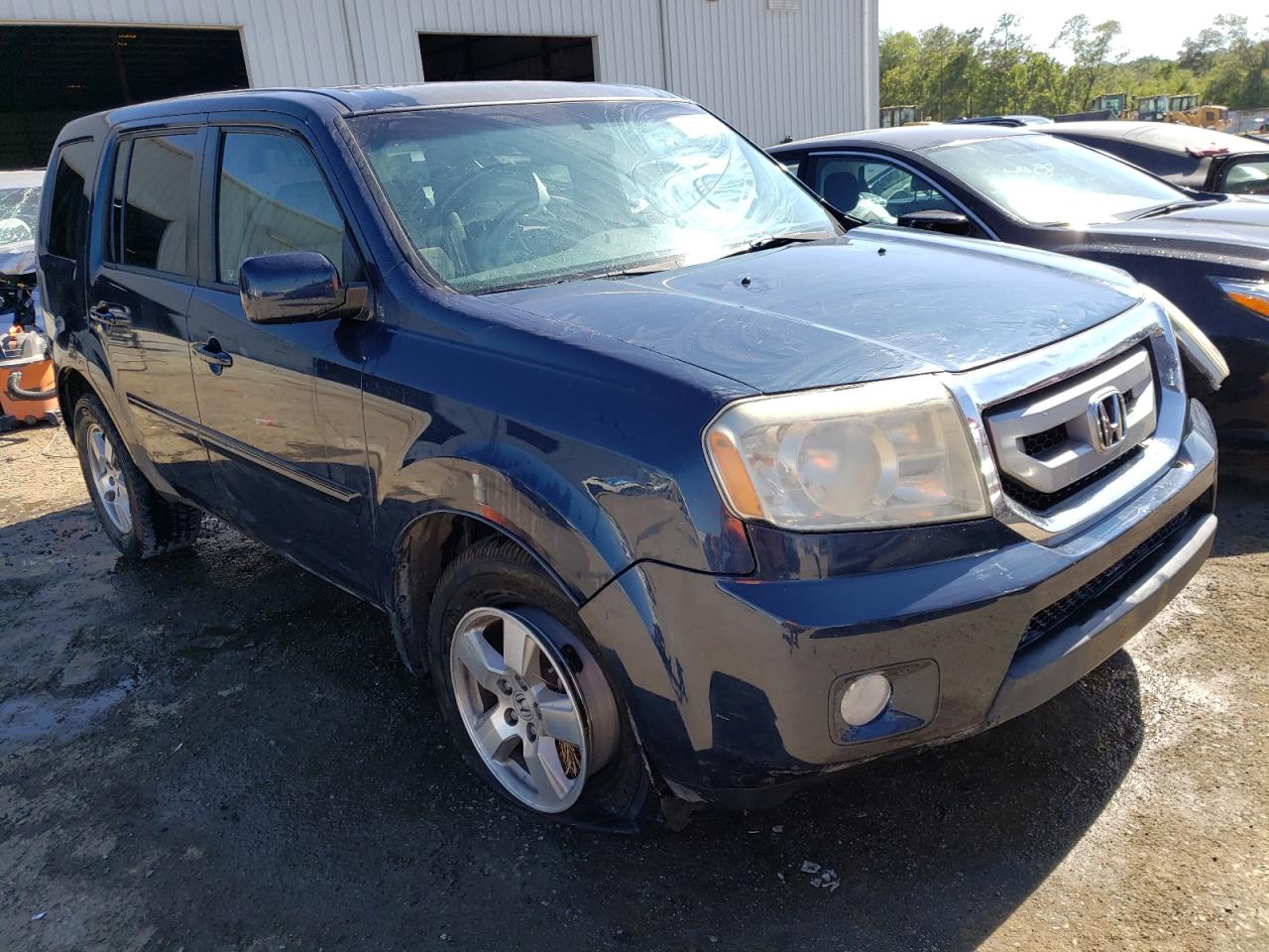 HONDA PILOT EXL 2011 with VIN 5FNYF3H59BB047289 - Photo from auction