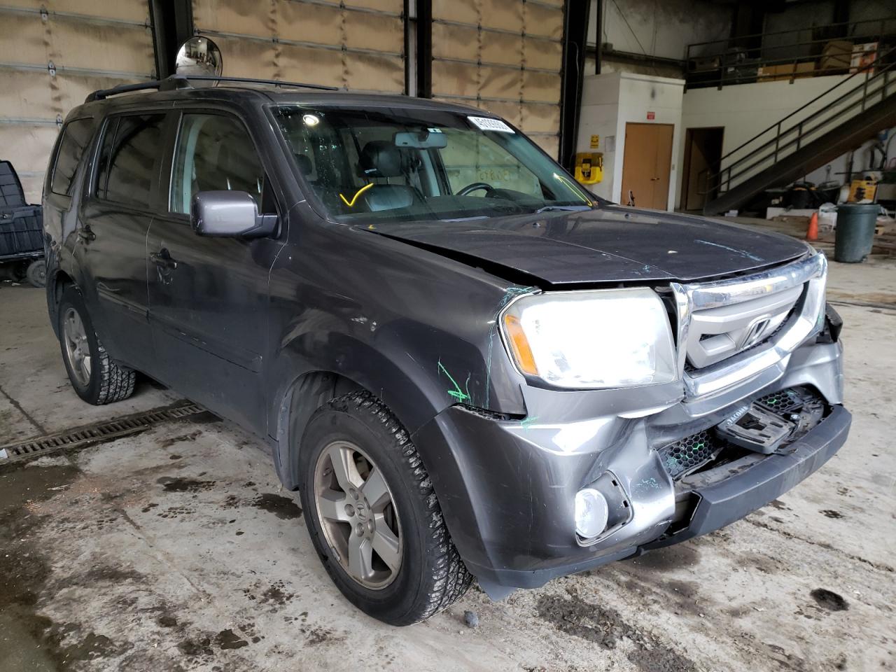 HONDA PILOT EXL 2011 with VIN 5FNYF4H53BB104933 - Photo from auction