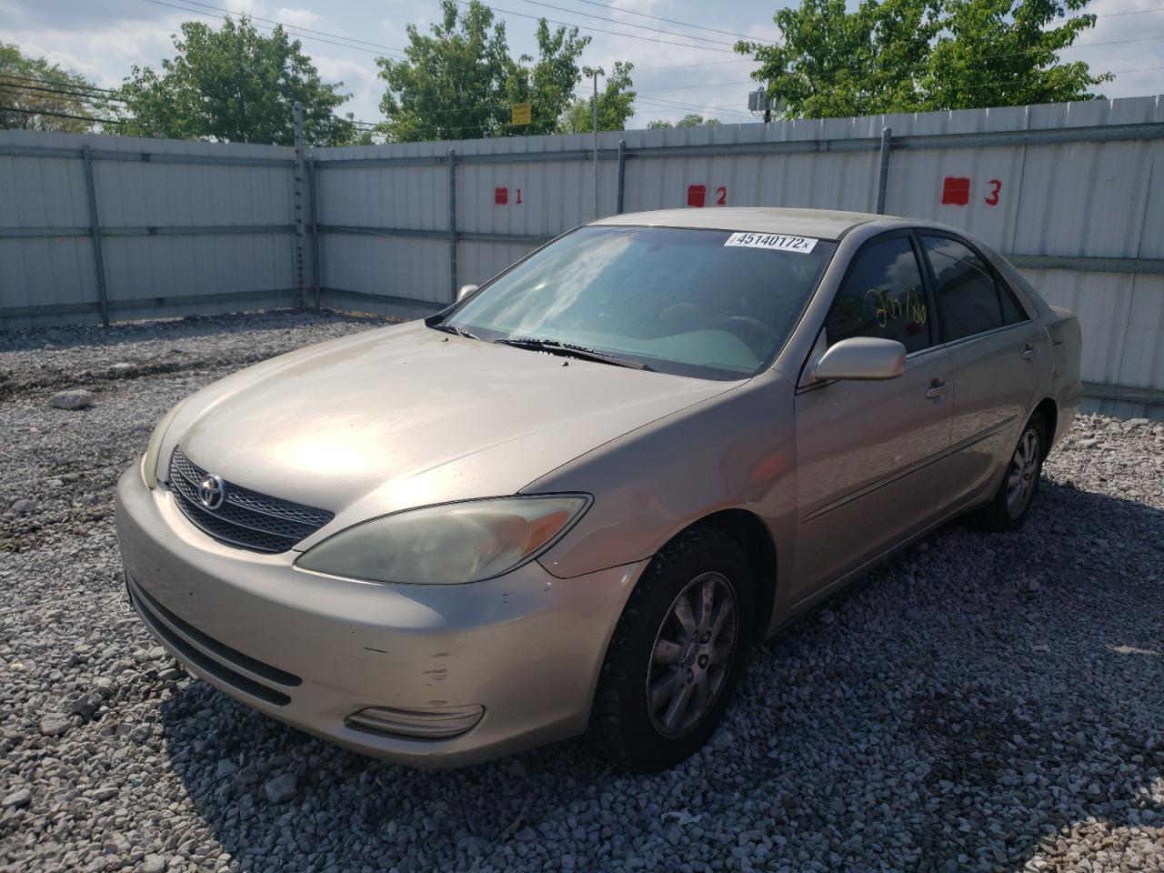 Photo 2 from auction – 2002 TOYOTA CAMRY LE with VIN JTDBF32K020079650