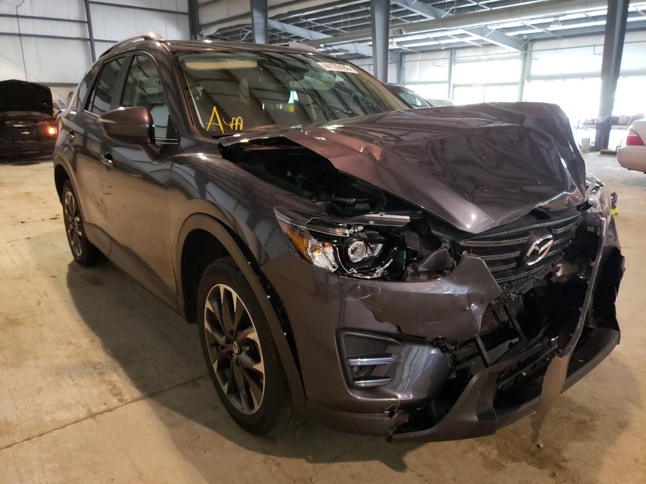 MAZDA CX-5 GT 2016 with VIN JM3KE4DY2G0625552 - Photo from auction