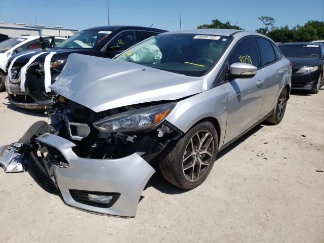 Photo 2 from auction – 2017 FORD FOCUS SE with VIN 1FADP3FE1HL289357