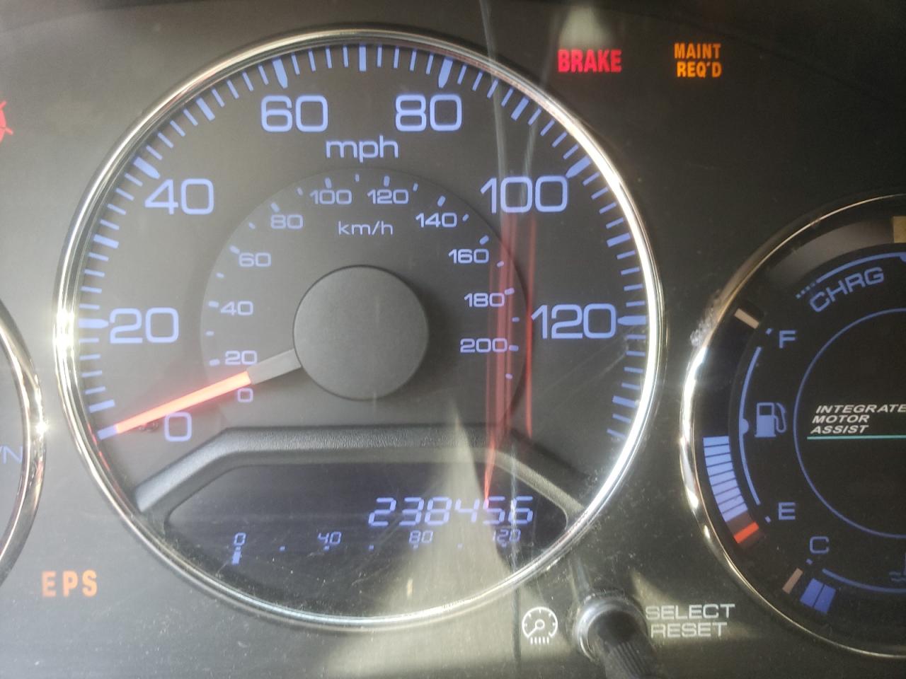 Photo 8 from auction – 2004 HONDA CIVIC HYBR with VIN JHMES95614S005413