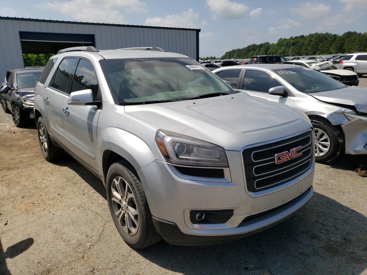 GMC ACADIA SLT 2013 with VIN 1GKKRSKD7DJ174582 - Photo from auction
