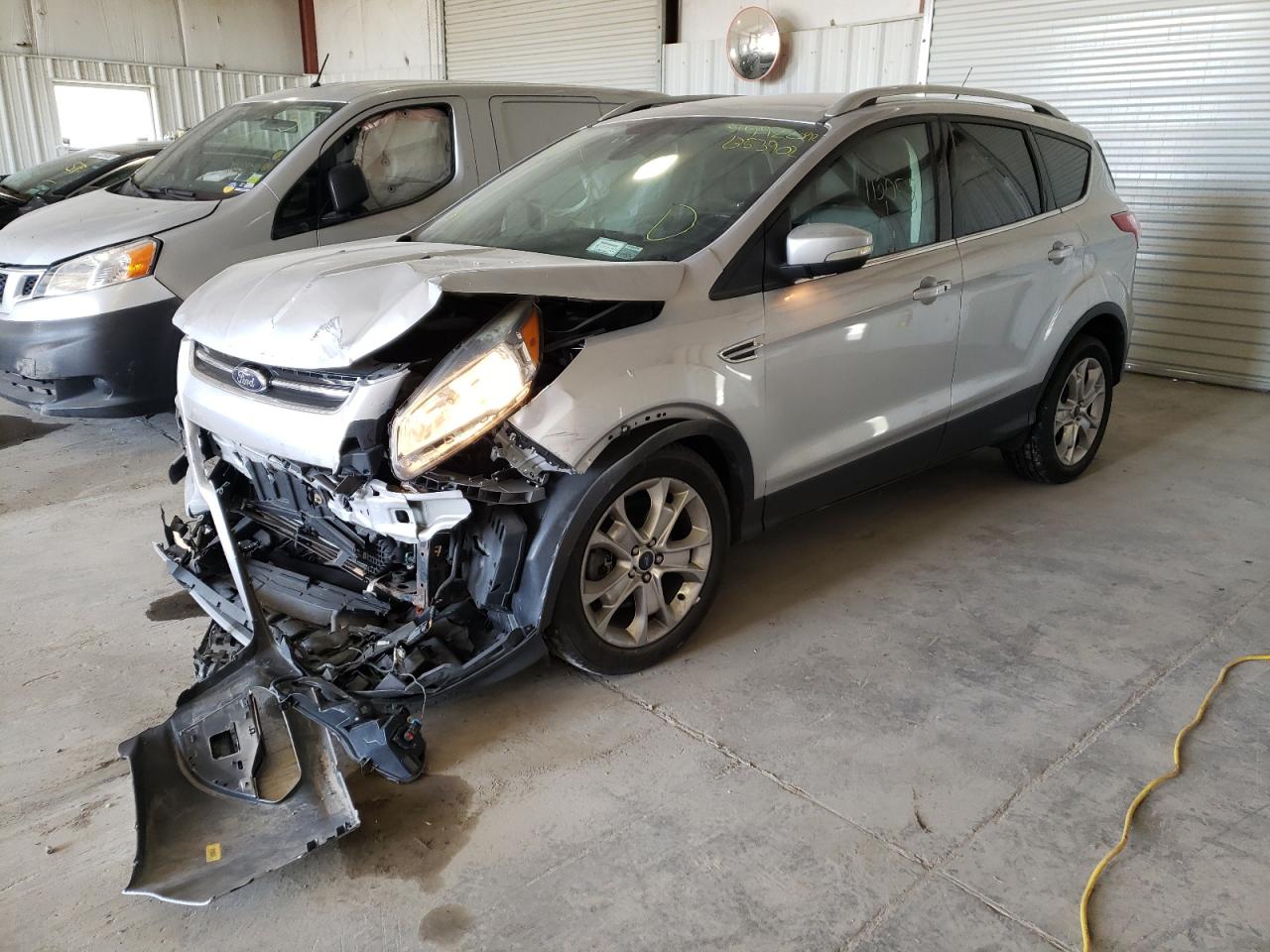 Photo 2 from auction – 2014 FORD ESCAPE TIT with VIN 1FMCU9JX6EUB53902
