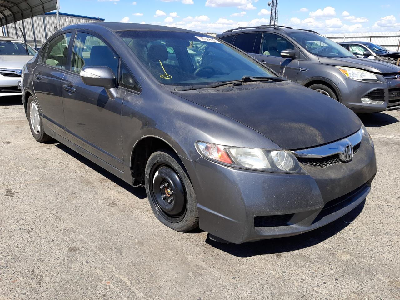 Photo 1 from auction – 2010 HONDA CIVIC HYBR with VIN JHMFA3F20AS005205