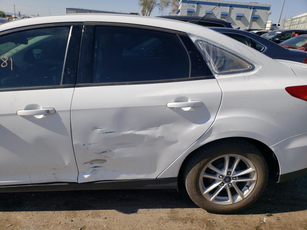 Photo 9 from auction – 2015 FORD FOCUS SE with VIN 1FADP3F27FL255779
