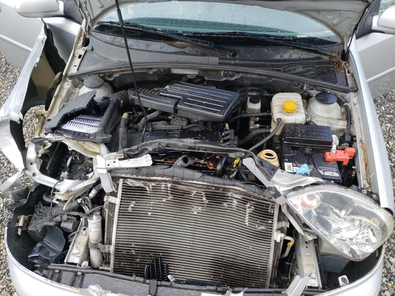 Photo 7 from auction – 2004 SUZUKI FORENZA LX with VIN KL5JJ52ZX4K011985