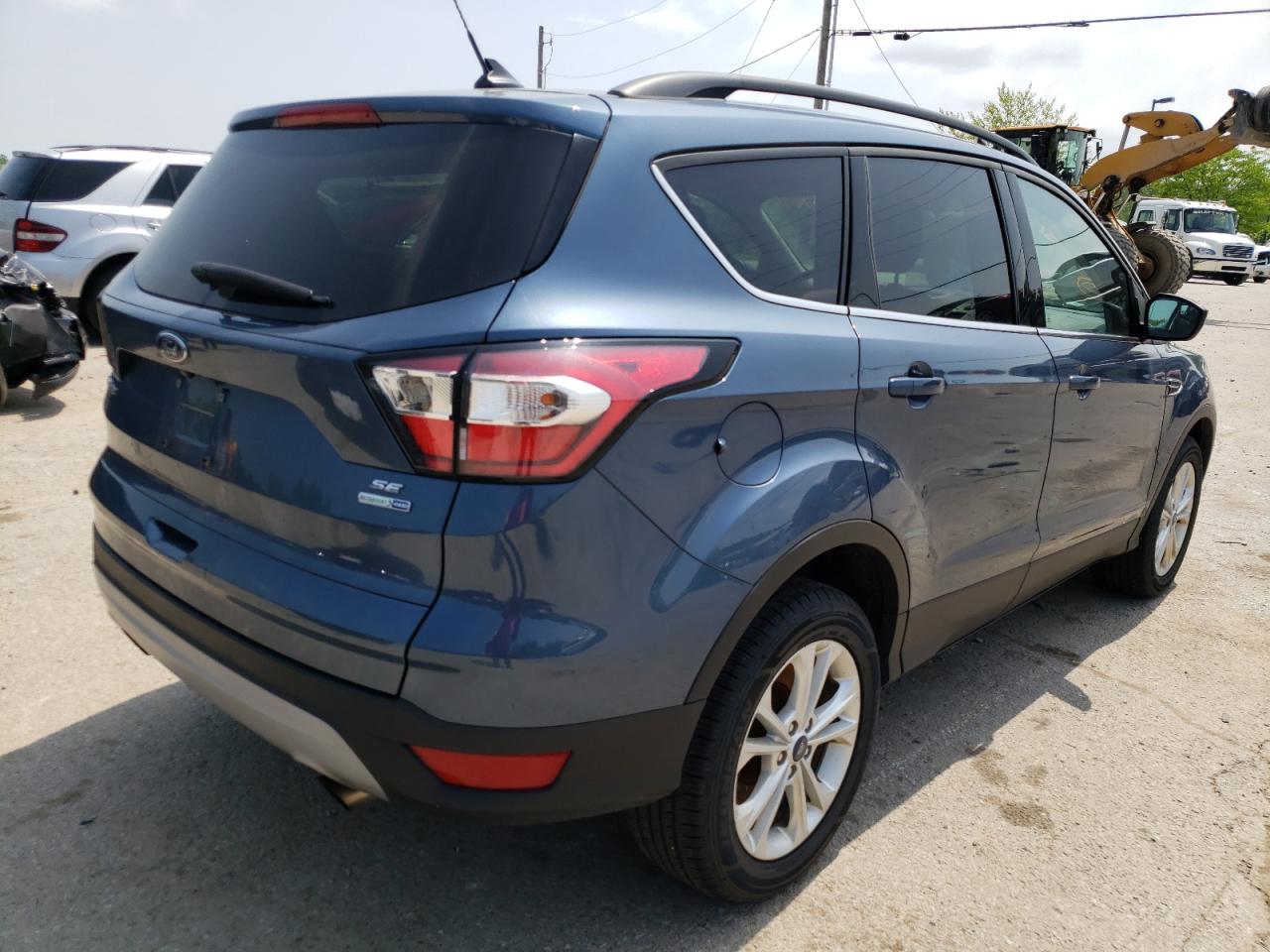 Photo 4 from auction – 2018 FORD ESCAPE SE with VIN 1FMCU9GD0JUC24244