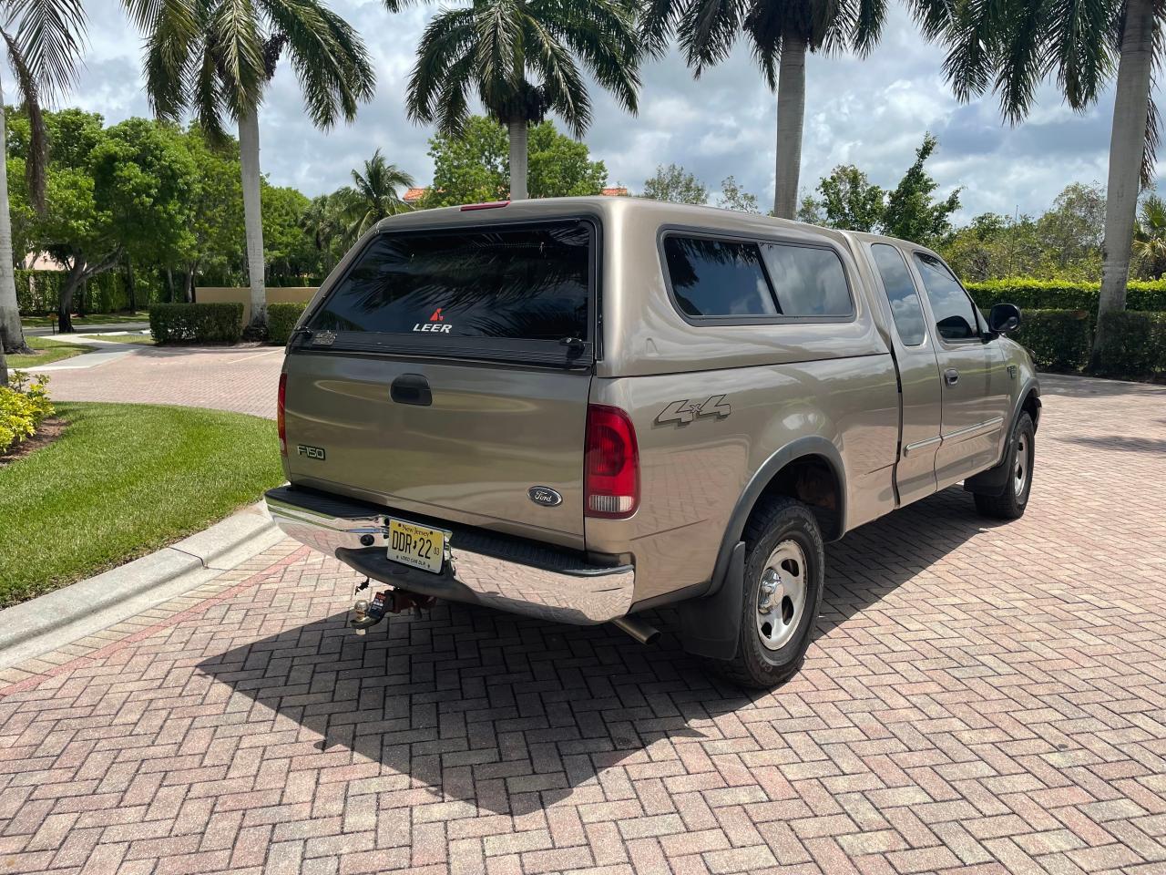 Photo 4 from auction – 2003 FORD F150 with VIN 2FTRX18W23CA97989