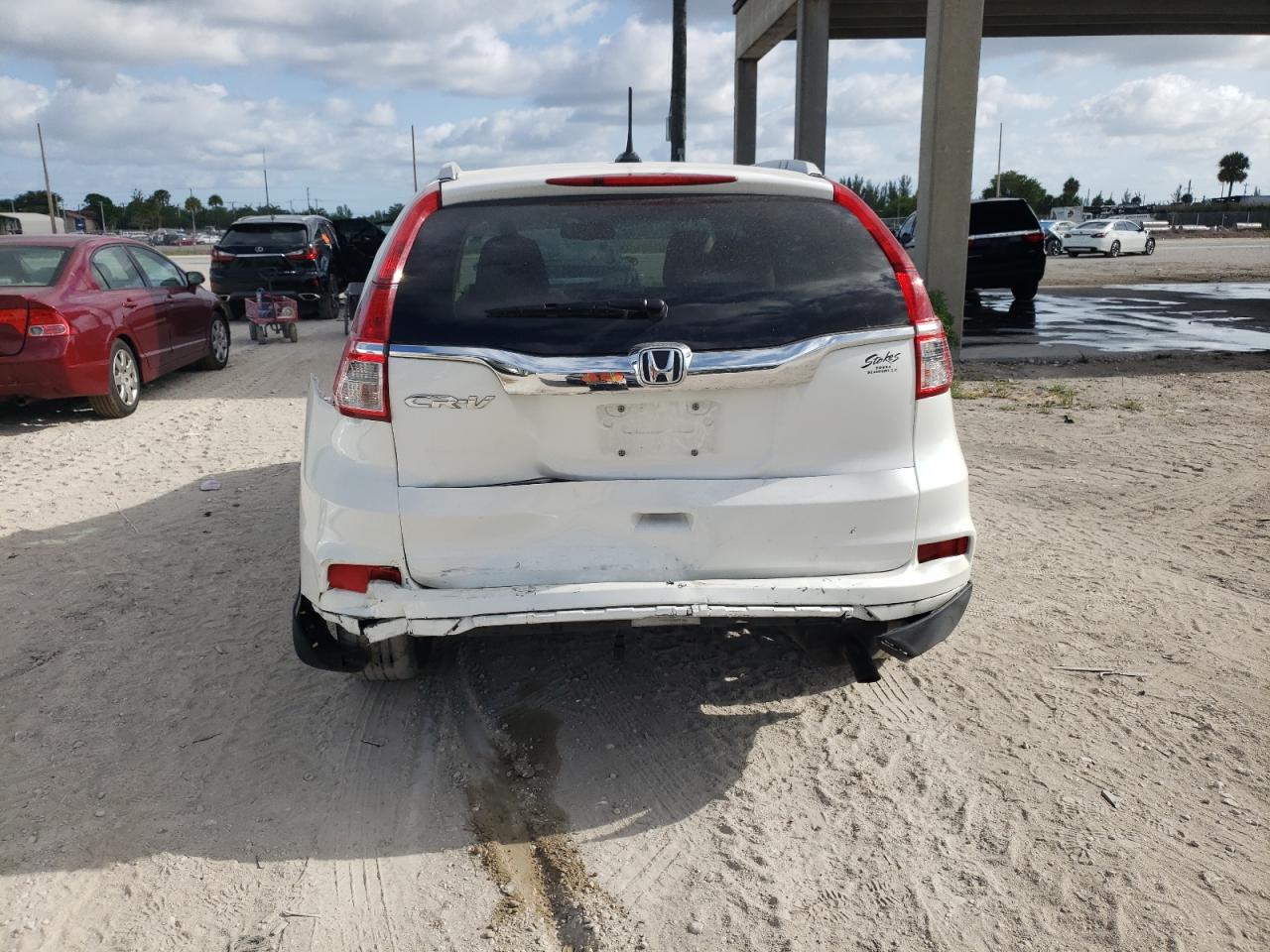 Photo 9 from auction – 2016 HONDA CR-V EXL with VIN 5J6RM3H75GL017779