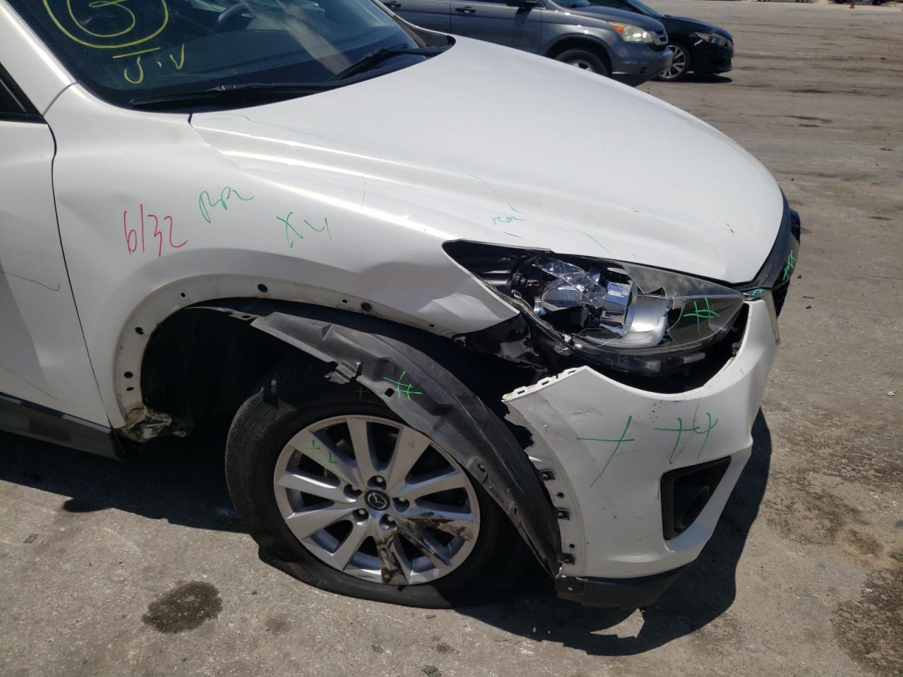 Photo 9 from auction – 2013 MAZDA CX-5 TOURI with VIN JM3KE2CE5D0158022