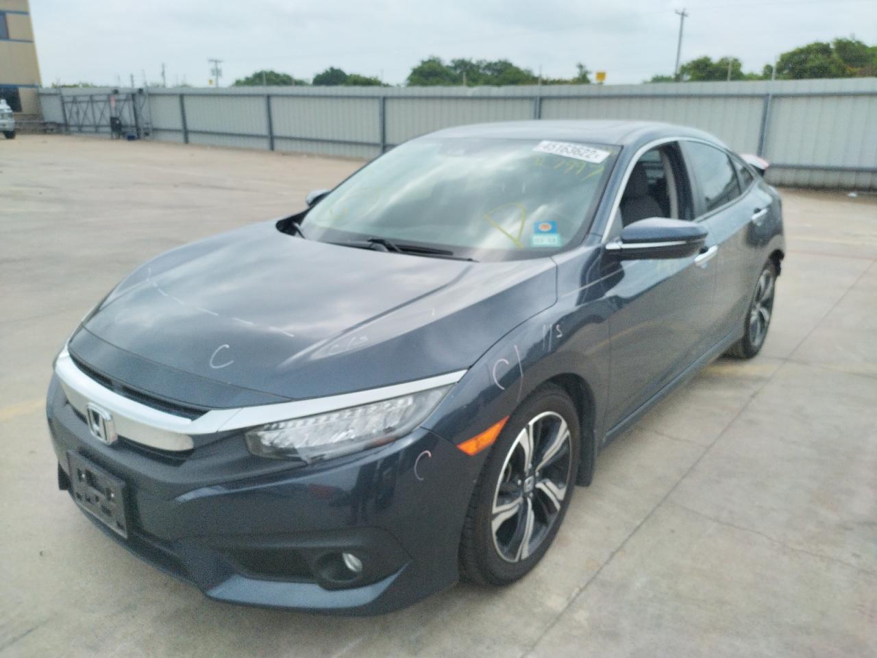 Photo 2 from auction – 2018 HONDA CIVIC TOUR with VIN JHMFC1F96JX027997